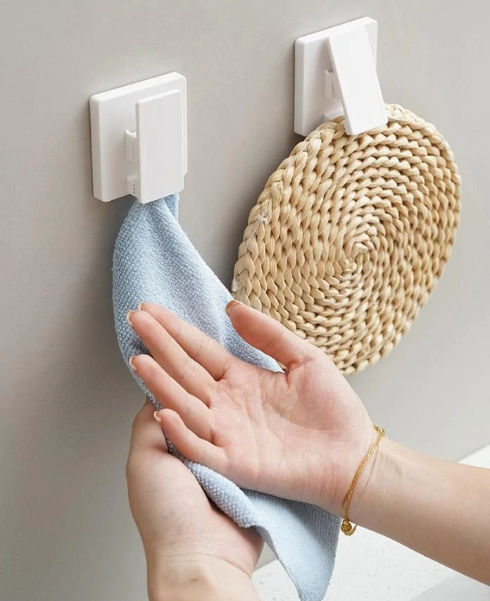 Samolepiaci nástenný držiak na tuby - čierny