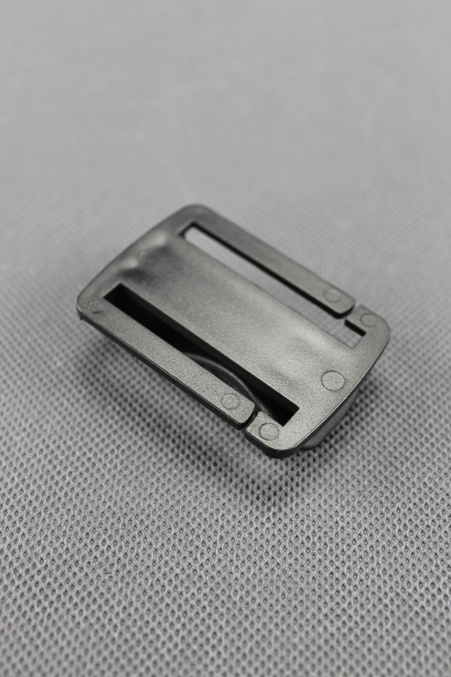 Klipsa na uchytenie krytky na popruh ELEMENTRIX