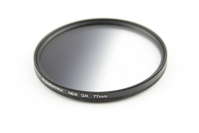 Elementrix šedý ND8 prechodový filter 52mm text. pouzdro