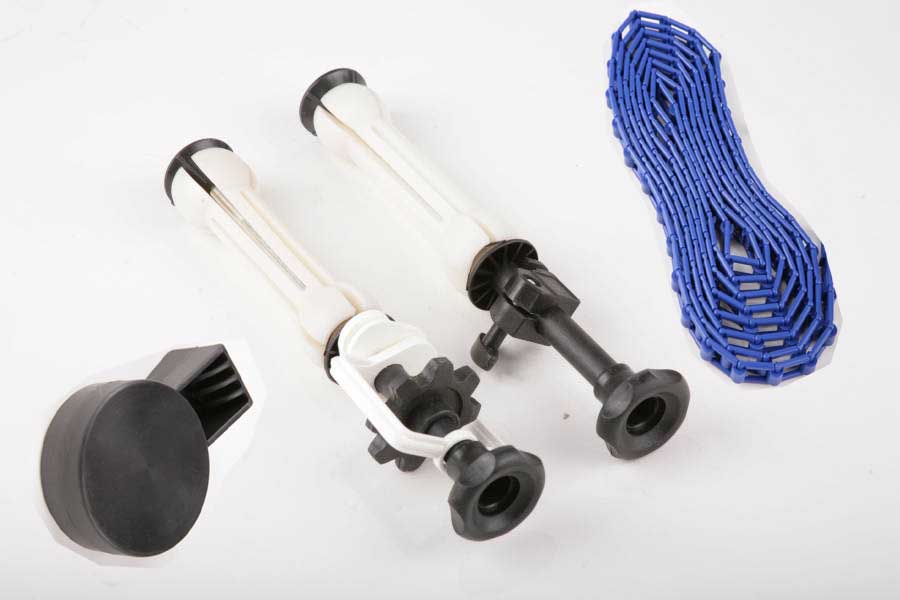 Držiak a tŕňom pre zavesenie dvoch roliek pozadím na stenu, strop a statív