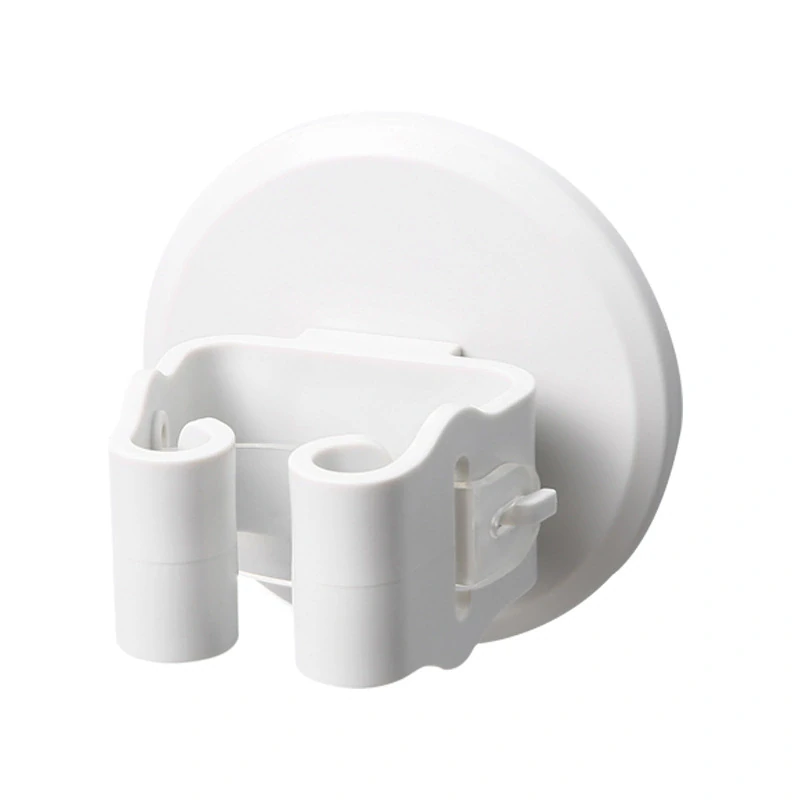 Samolepiaci nástenný držiak na mop zeleno biely