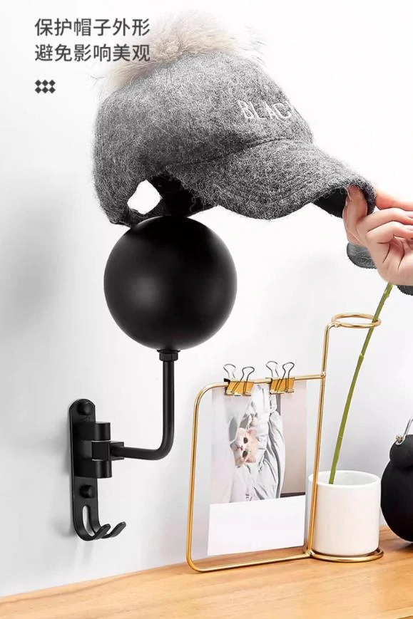 Vešiak na helmu – otočný držiak na stenu